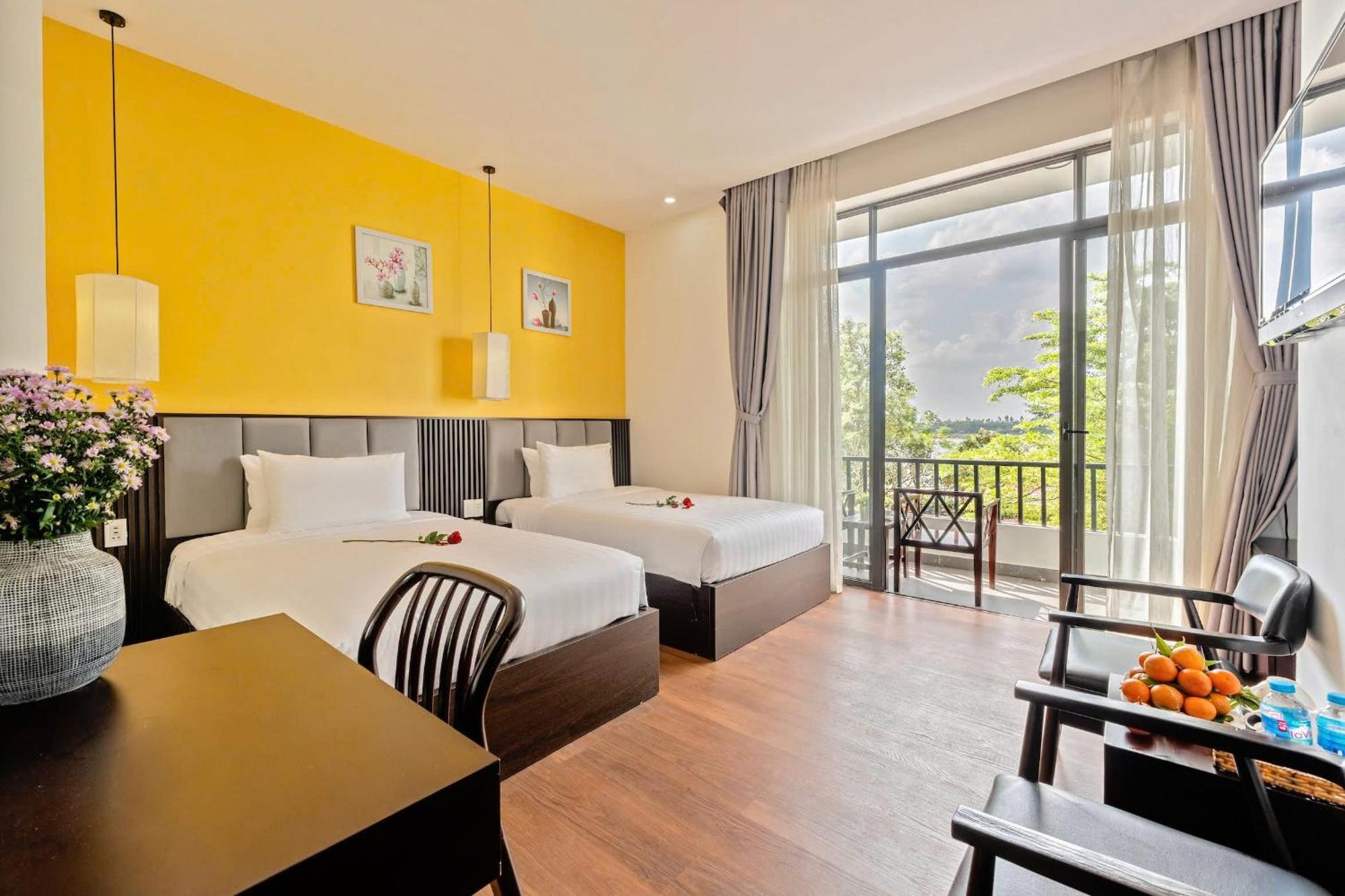 Serene Riverside Hotel Хой Ан Екстериор снимка